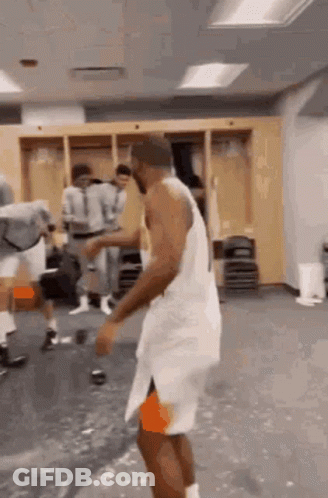 Basketball Player Dancing In Locker Room GIF