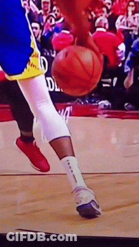 Basketball Player Dribbling Ball With Crowd GIF