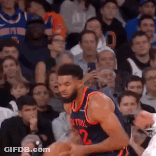 Basketball Player Dribbling In Front Of Crowd GIF