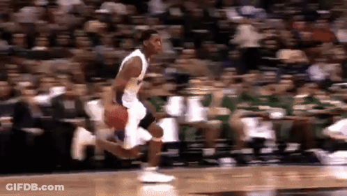 Basketball Player Dribbling On Court GIF