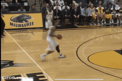 Basketball Player Dribbling With Milwaukee Banner GIF