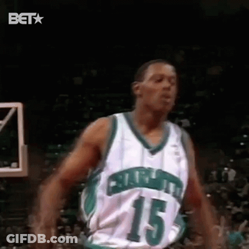 Basketball Player Green And White Number 15 Jumping GIF