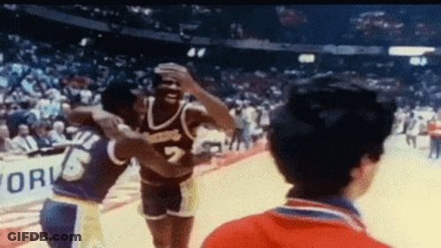 Basketball Player Hugging Number 7 GIF