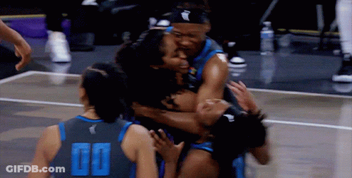 Basketball Player In 00 Jersey Hugged By Teammates GIF
