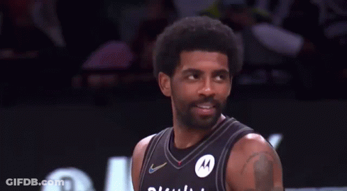 Basketball Player In Black Motorola Jersey Smiling GIF