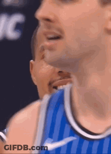 Basketball Player In Blue And White Striped Shirt GIF