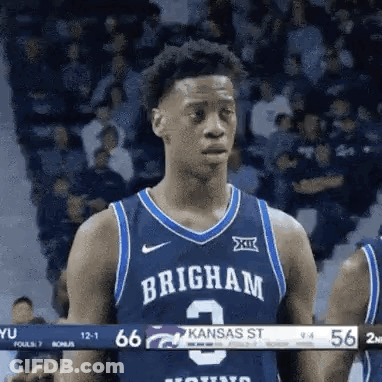 Basketball Player In Blue Jersey 3 In Front Of Crowd GIF