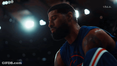 Basketball Player In Blue Jersey Looking Down GIF