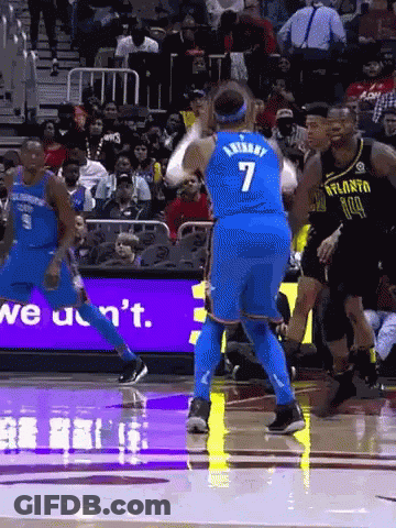 Basketball Player In Blue Jersey With Number 7 GIF