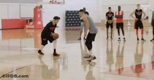 Basketball Player In Bulls Jersey Dribbling GIF