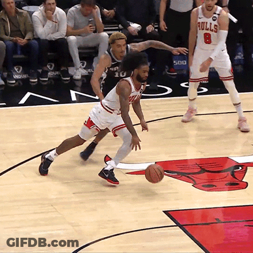 Basketball Player In Bulls Jersey Dribbling GIF