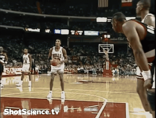 Basketball Player In Bulls Jersey Holding Ball GIF