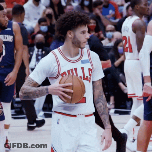 Basketball Player In Bulls Jersey Holding Ball GIF
