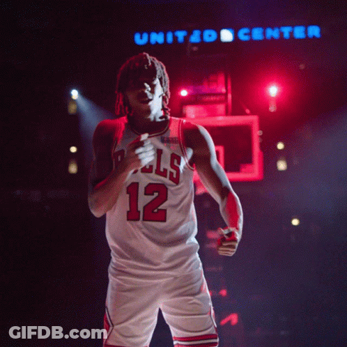 Basketball Player In Bulls Jersey Number 12 GIF