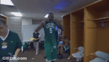 Basketball Player In Celtics Uniform Dancing In Locker Room GIF