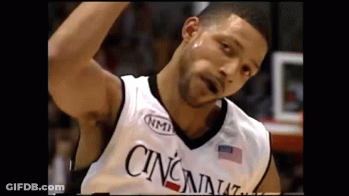 Basketball Player In Cincinnati Jersey Looking At Camera GIF