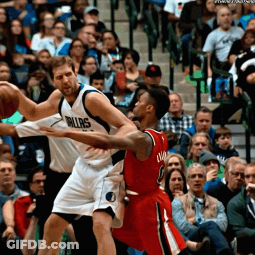 Basketball Player In Dallas Jersey Blocking Another GIF