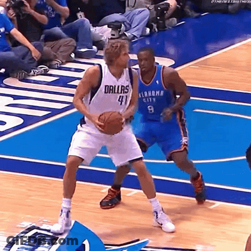 Basketball Player In Dallas Jersey Holding Ball GIF