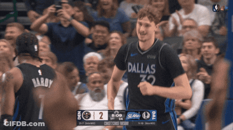 Basketball Player In Dallas Jersey In Front Of Crowd GIF
