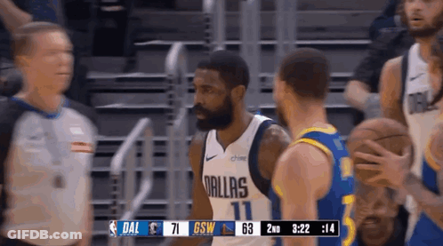 Basketball Player In Dallas Jersey Talking To Another Player GIF