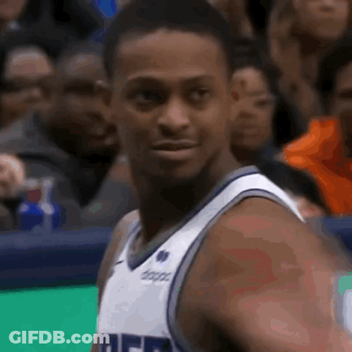 Basketball Player In Denver Jersey Looking At Camera GIF