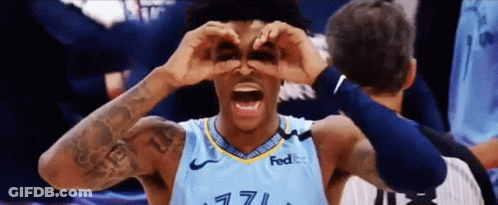 Basketball Player In FedEx Jersey Looking Through Hands GIF