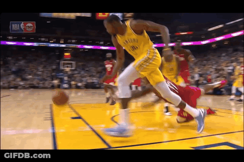 Basketball Player In Golden State Warriors Uniform Dribbling GIF