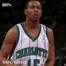 Basketball Player In Green And White Jersey GIF