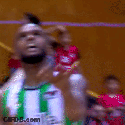 Basketball Player In Green And White Sevilla Jersey GIF