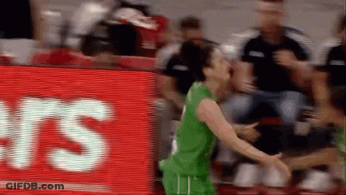 Basketball Player In Green Jersey In Front Of RS Sign GIF