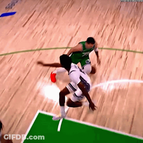 Basketball Player In Green Jersey Number 7 Fouled GIF