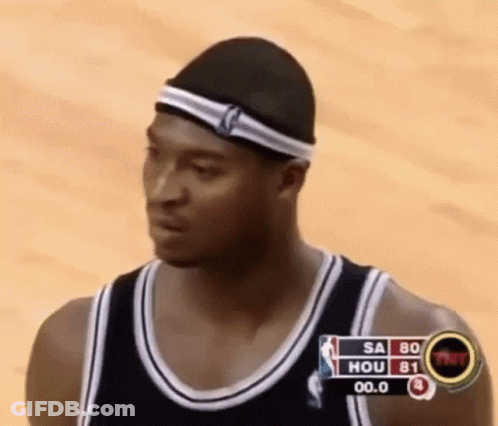 Basketball Player In Headband Looking At Scoreboard GIF
