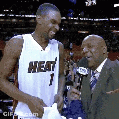 Basketball Player In Heat Jersey Interviewed By Fox News Reporter GIF