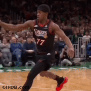 Basketball Player In Jersey Number 77 GIF