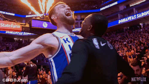 Basketball Player In K Jersey Celebrates With Teammate GIF