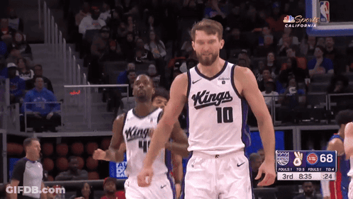 Basketball Player In Kings Jersey In Front Of Crowd GIF