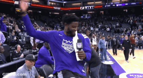 Basketball Player In Kings Shirt Holding Microphone GIF