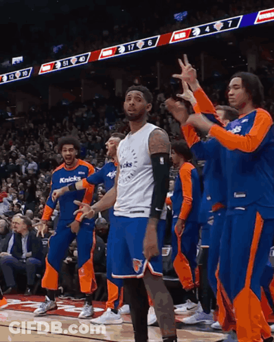 Basketball Player In Knicks Jersey On Court With Teammates GIF