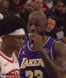 Basketball Player In Lakers Jersey Eating GIF
