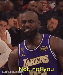 Basketball Player In Lakers Jersey Standing In Front Of Crowd GIF