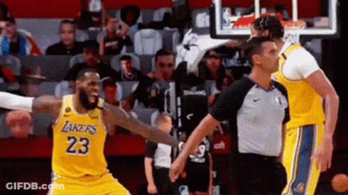 Basketball Player In Lakers Jersey Talking To Referee GIF