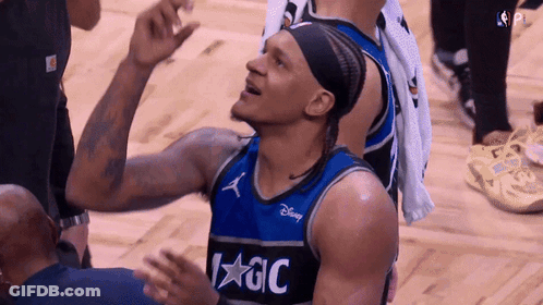 Basketball Player In Magic Jersey Looking Up GIF