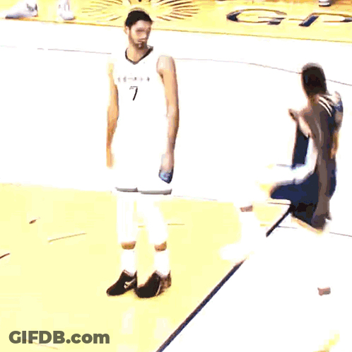 Basketball Player In Memphis Jersey On Yellow Court GIF