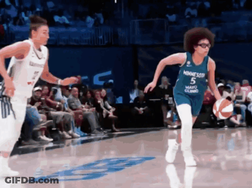 Basketball Player In Minnesota Jersey Dribbling GIF