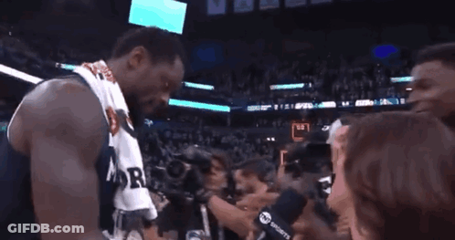 Basketball Player In Minnesota Jersey Shaking Hands GIF