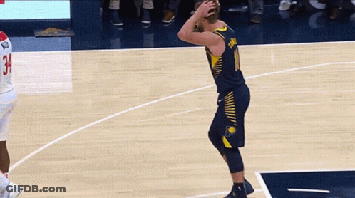 Basketball Player In Number 10 Jersey Dribbling GIF