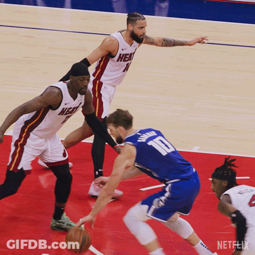 Basketball Player In Number 10 Jersey Dribbling GIF