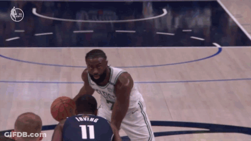 Basketball Player In Number 20 Jersey Laying On Floor GIF