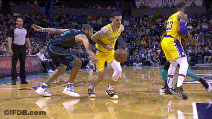Basketball Player In Number 23 Jersey Dribbling GIF