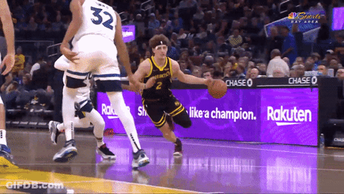 Basketball Player In Number 32 Jersey Dribbling GIF